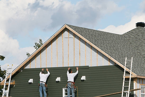 Professional Siding Installation technician working in Rome, OH